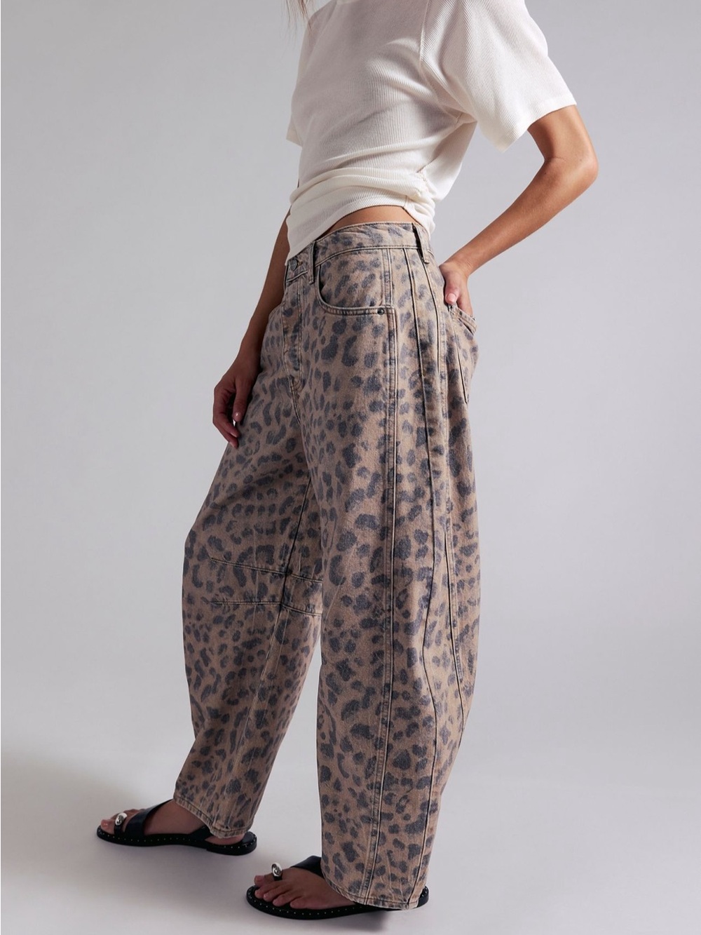 We The Free Leopard Print mid rise barrel Jeans in Light brown and faded black. - Picture 8 of 9